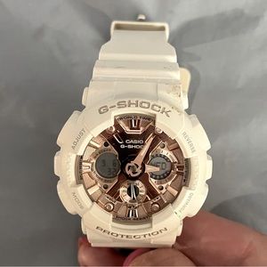 Casio Gshock white watch.